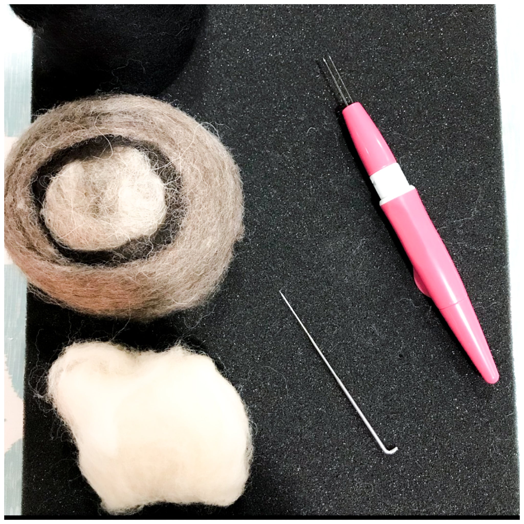 Felted wool, spun wool and a felting needle. How to repair holes in boiled wool